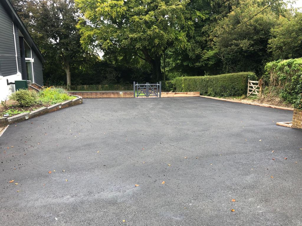 This is a photo of a bitumen driveway which is in the process of being installed by Tamworth Road Tek