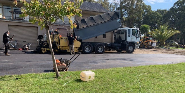 This is a photo of an asphalt driveway which is in the process of being installed by Tamworth Road Tek